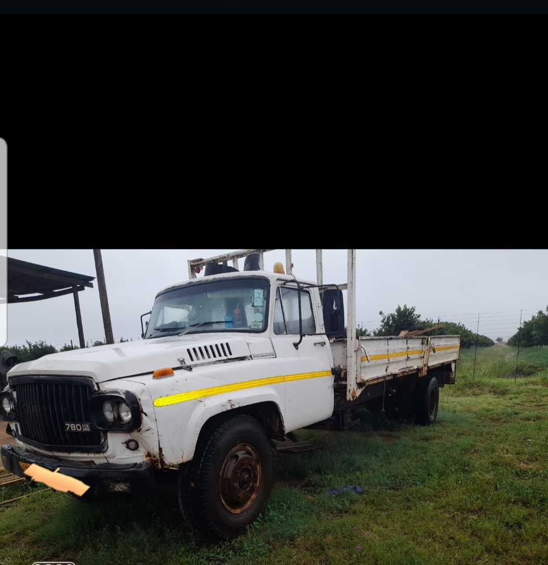 A picture of Nissan UG 780 8 ton flat truck