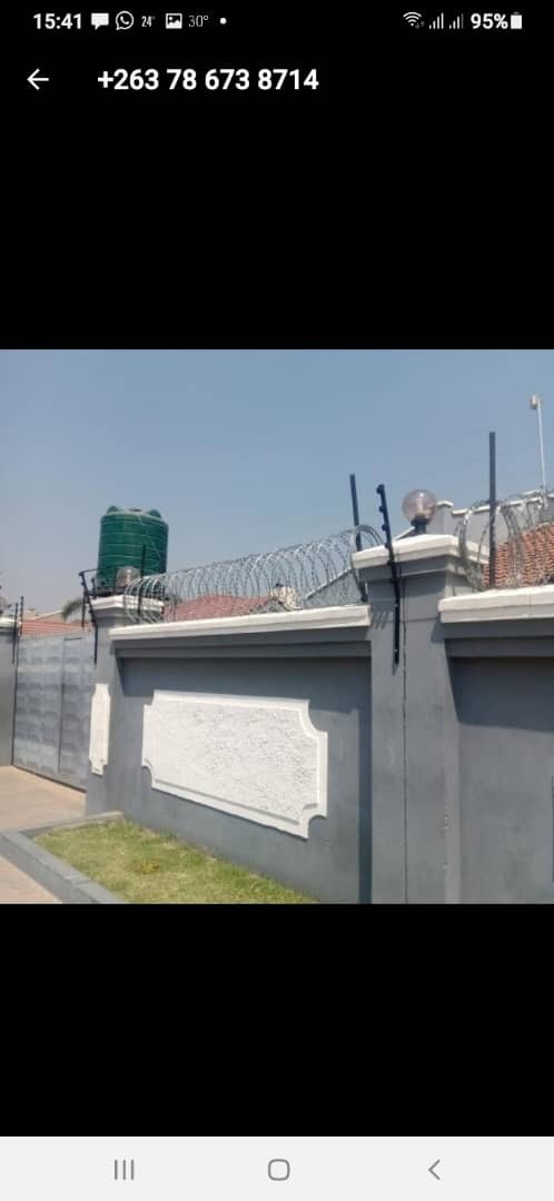A picture of Razorwire and Electric Fence. 