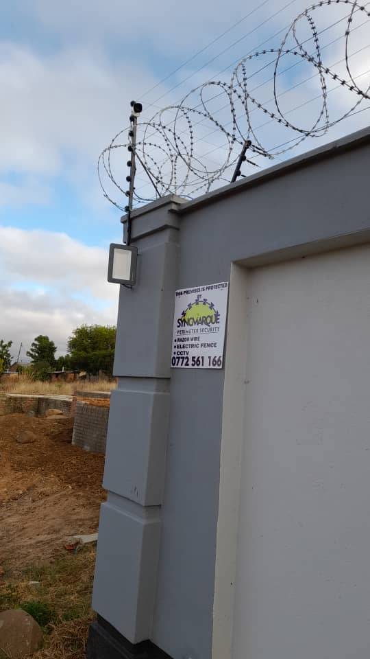 A picture of Razorwire and Electric Fence. 