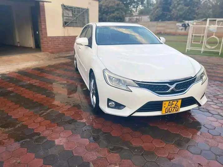A picture of Toyota mark x 2013 model 15000 neg Auto trans 70k